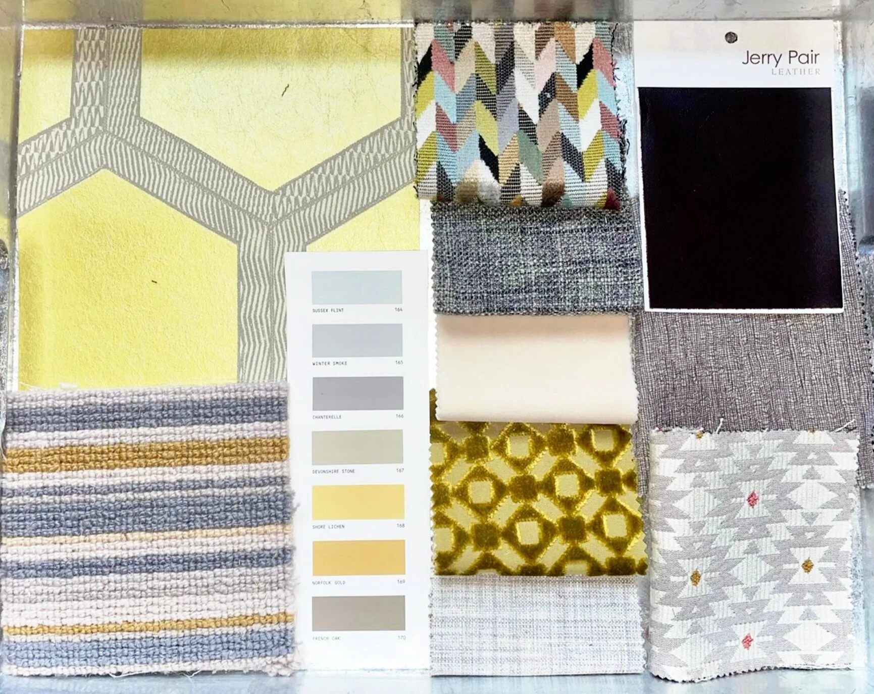 This was part of a preliminary design for a much larger interior design project. The client wanted pattern but not flowers. We stuck to geometric patterns and textures.