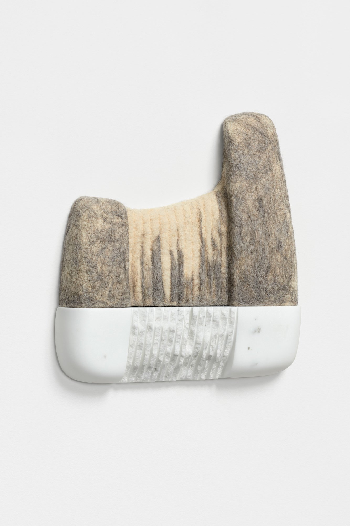 Bridging The Gap, 2021, marble and wool, 13 x 12 x 3 inches, private collection