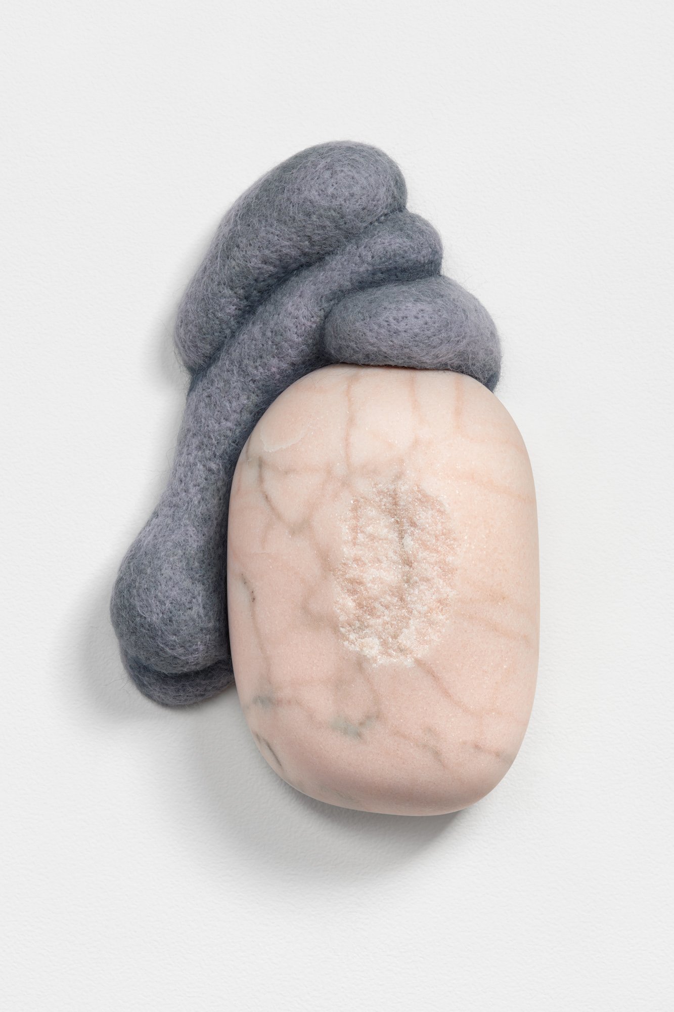 Passive, 2022, Portuguese pink marble and wool, 8 x 6 x 3 inches, private collection