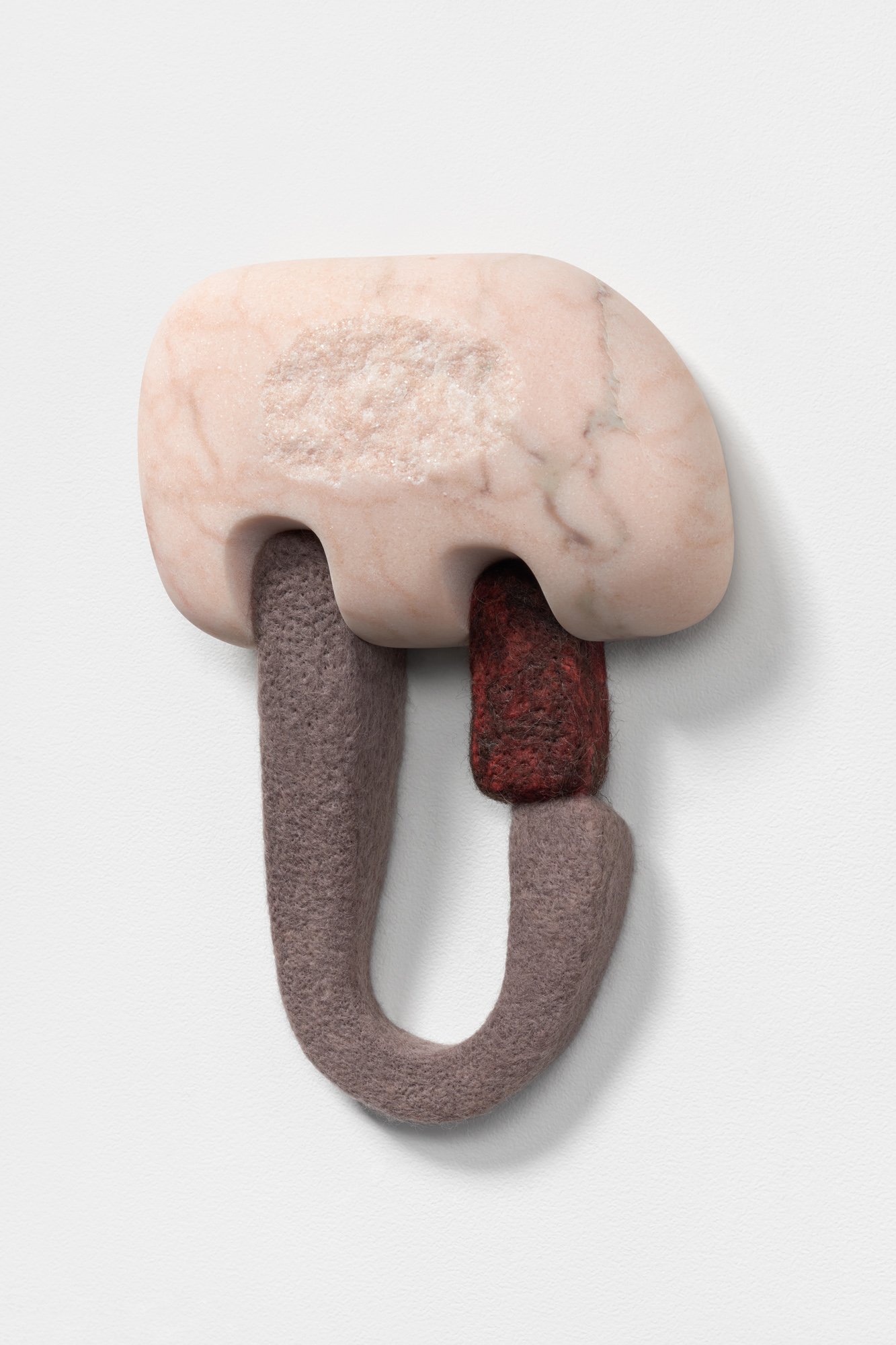 Sinew, 2022, Portuguese pink marble, wool, 11 x 8 x 3 inches