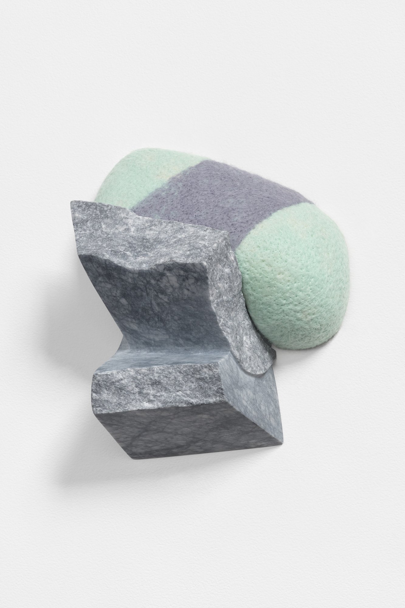 Imprint, 2022, reclaimed marble and wool, 7 x 7 x 4 inches