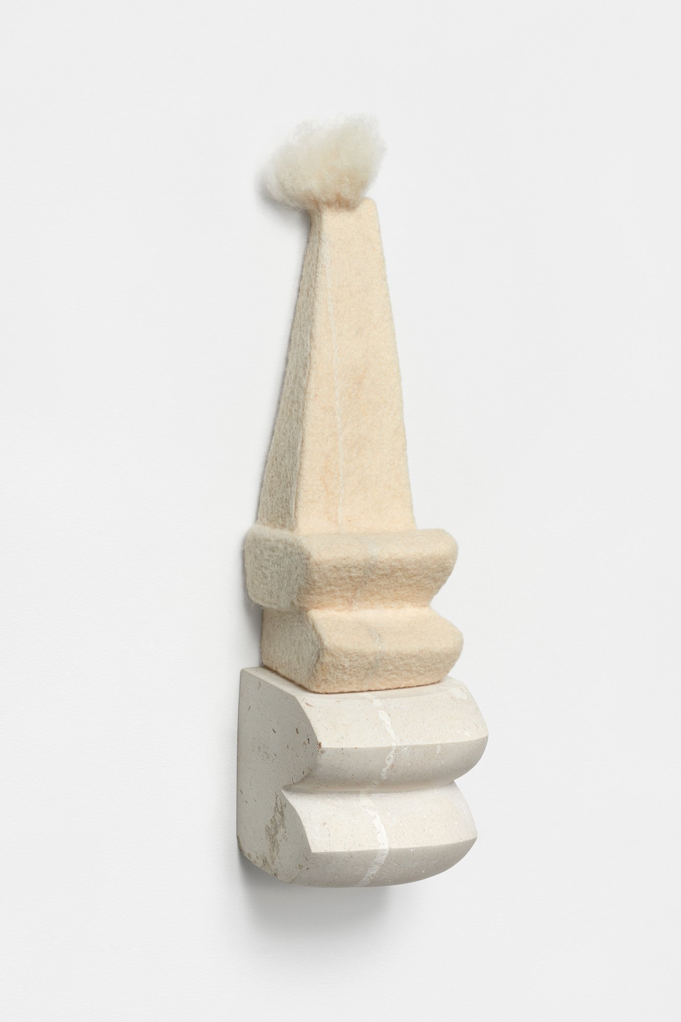 Folly, 2020, limestone and wool, 16 x 4 x 5 inches, private collection