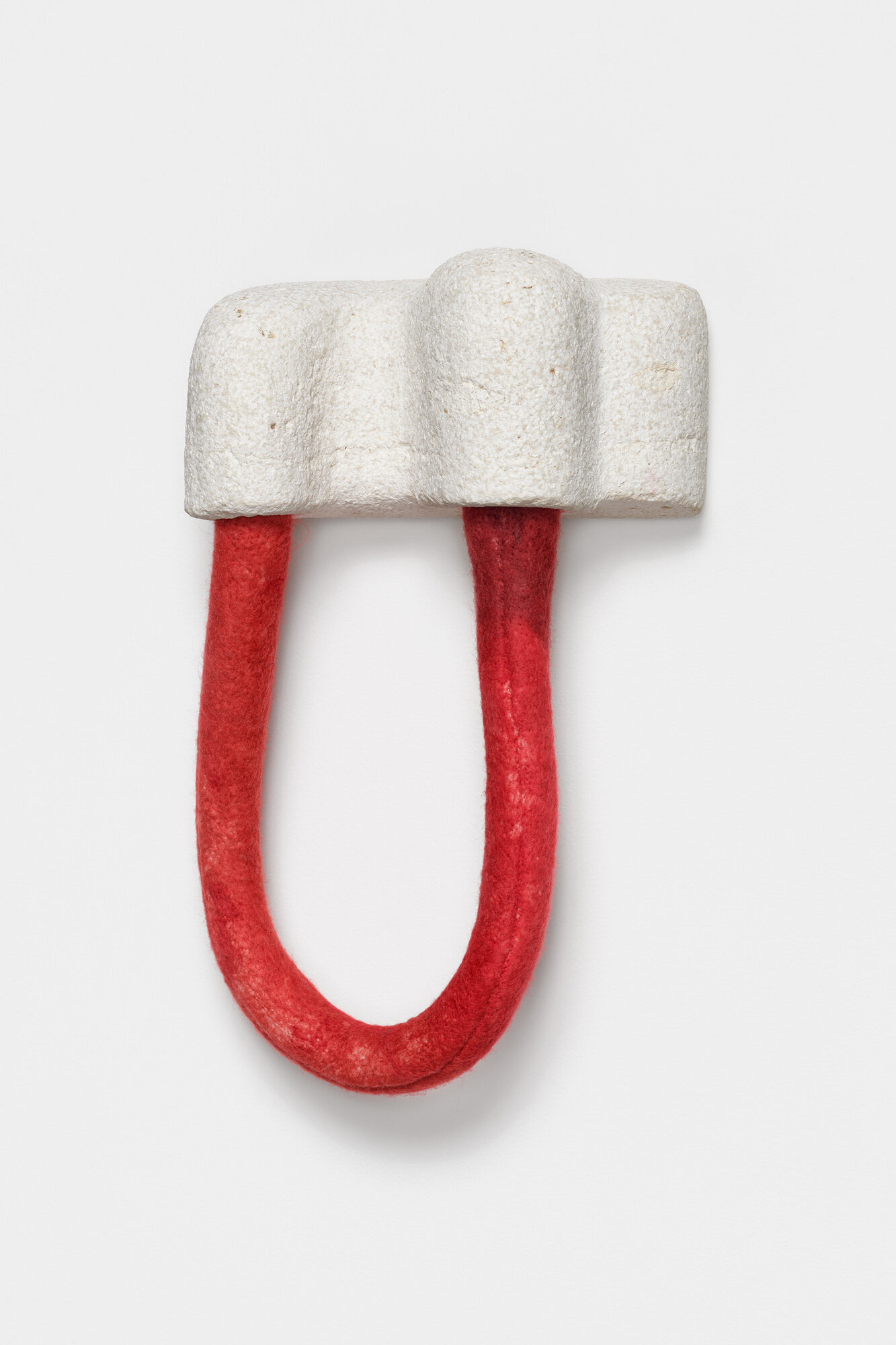 Stronghold, 2020, travertine, wool, 14 x 8 x 5 inches, private collection