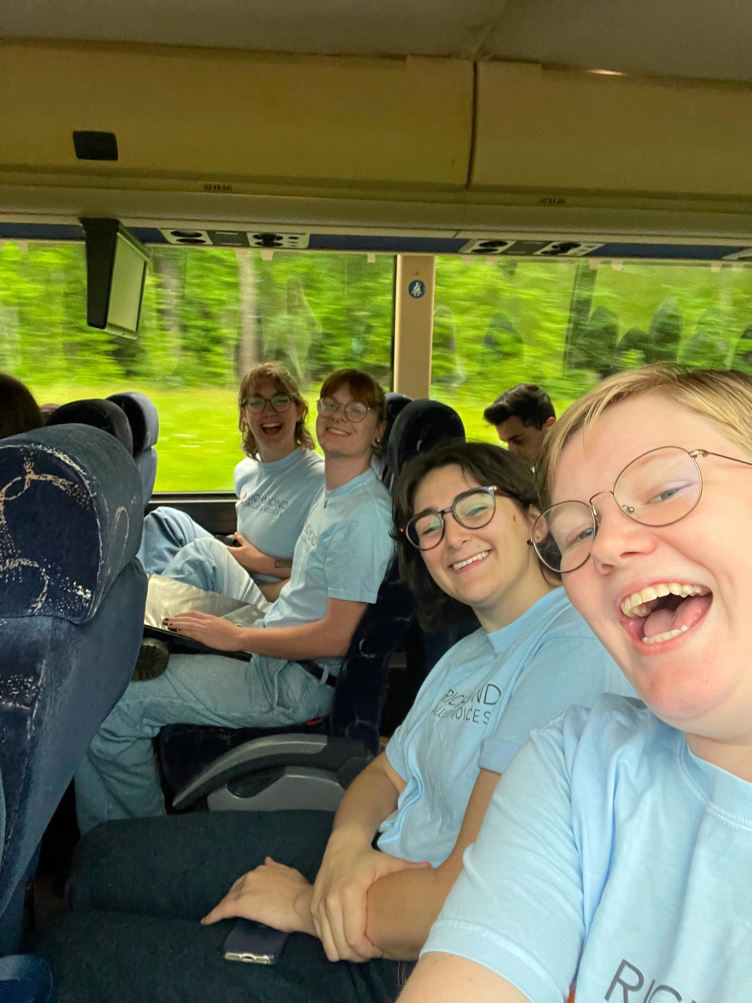 on the bus to World Pride 2025