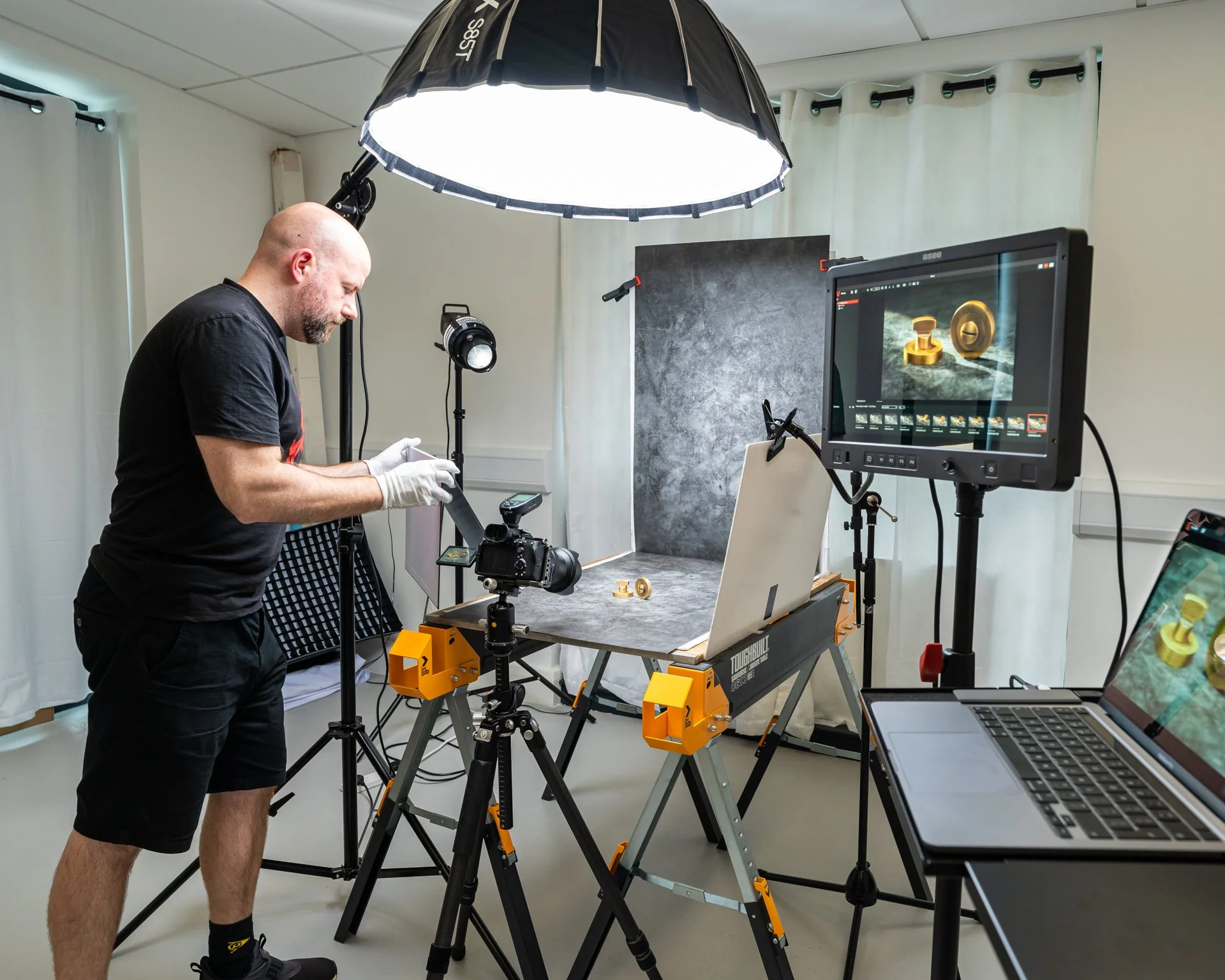 Behind the scenes of Mark Duffy in his studio capturing product photography of a set of premium door handles