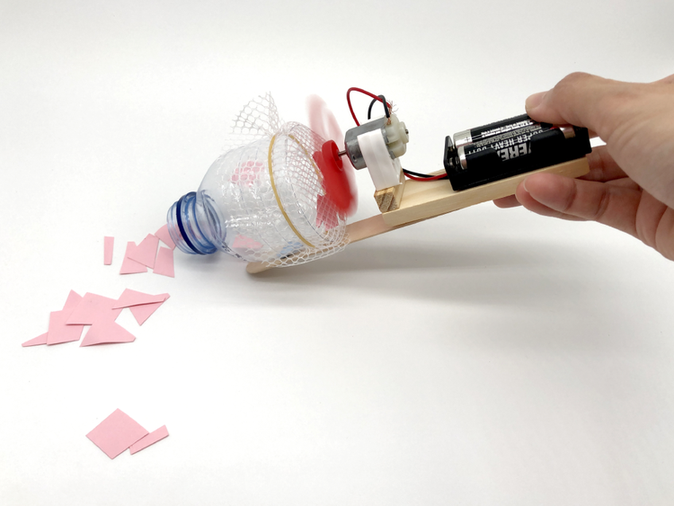 DIY vacuum cleaner prototype made with simple materials and a motor for a STEM workshop