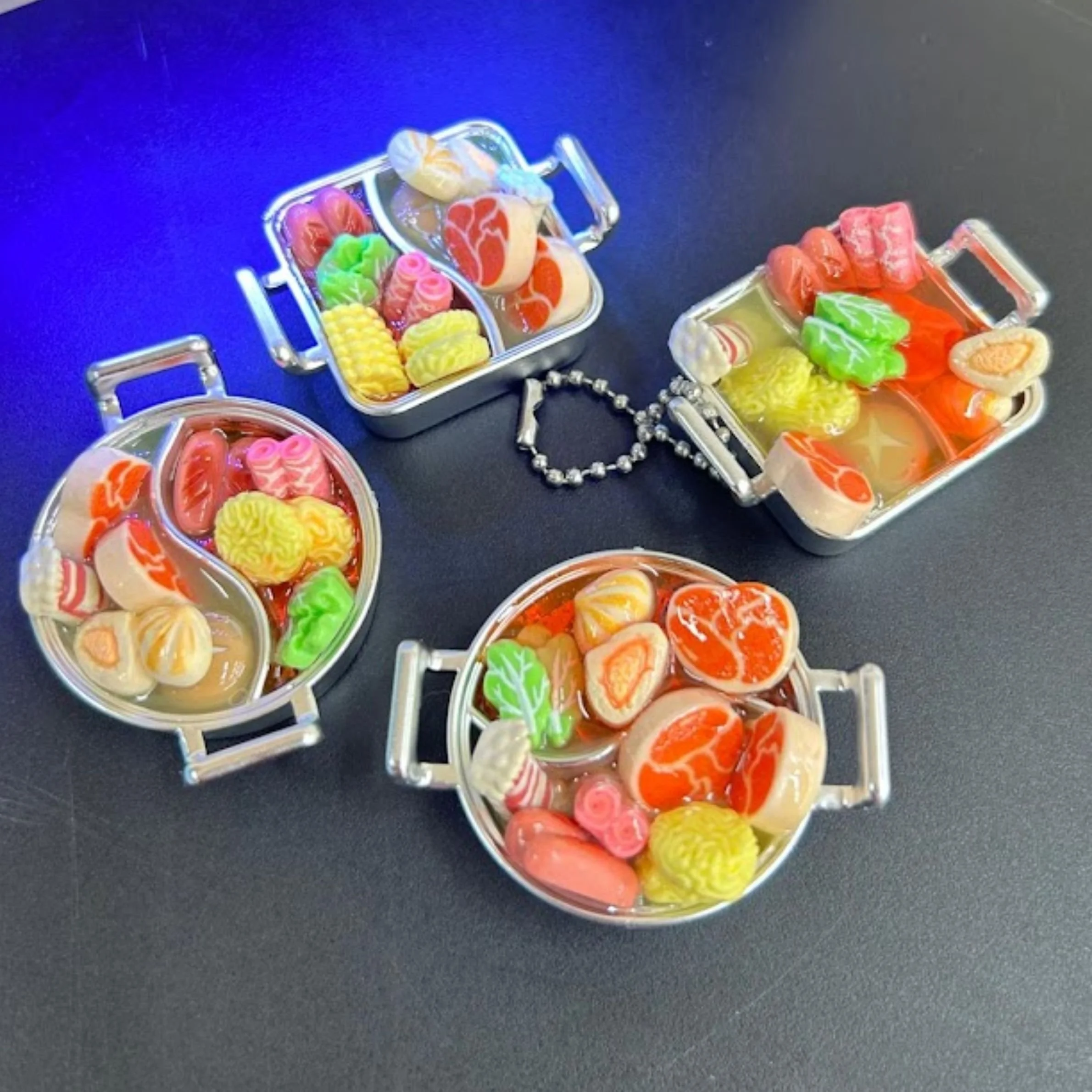 Participants creating a DIY mini hotpot craft activity for Chinese New Year celebrations in Singapore.