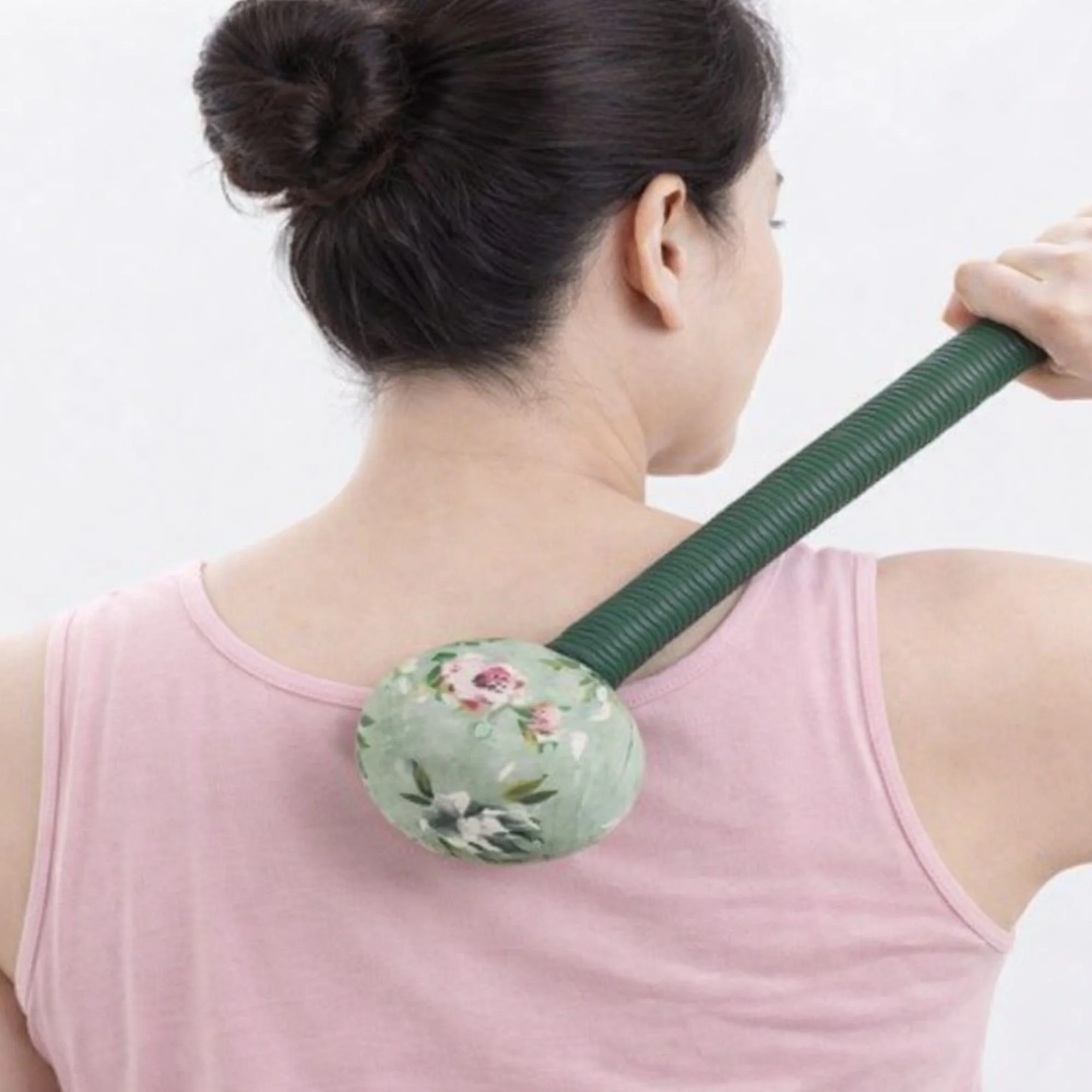 Handmade herbal hammer massager created during a Mother’s Day wellness workshop