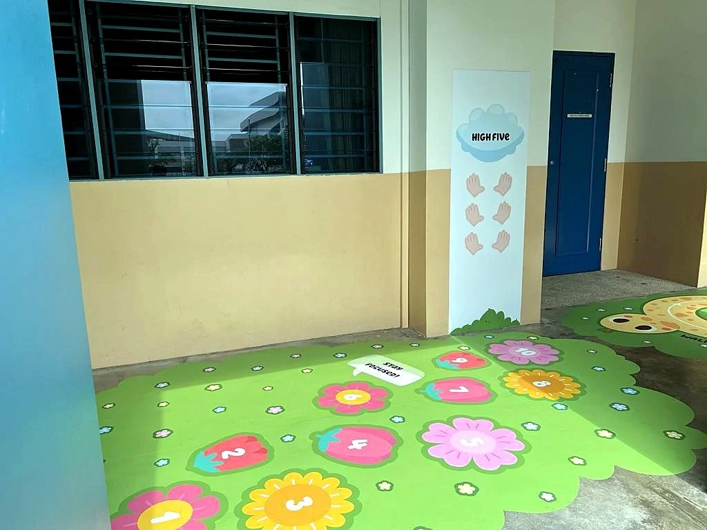 School sensory trail with stepping, high-five and movement activities supporting coordination and sensory engagement