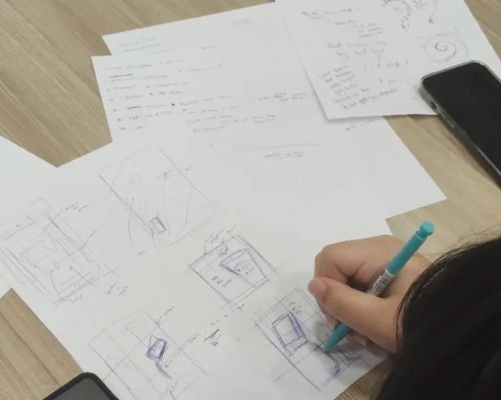 College and university students sketching visual metaphors for an anti-shop theft Design Thinking project for SPF and NCPC