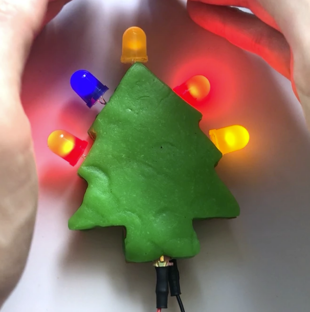 Dough circuit activity with LED lights for a hands-on STEM workshop