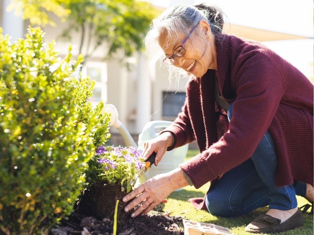 Open Village senior care activity space with gardening and purposeful ageing engagement