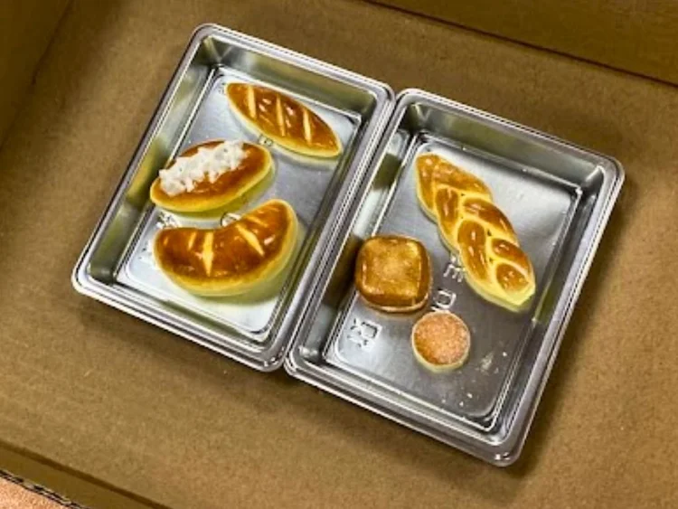 Miniature bread artworks created by students during a Little Baker art workshop