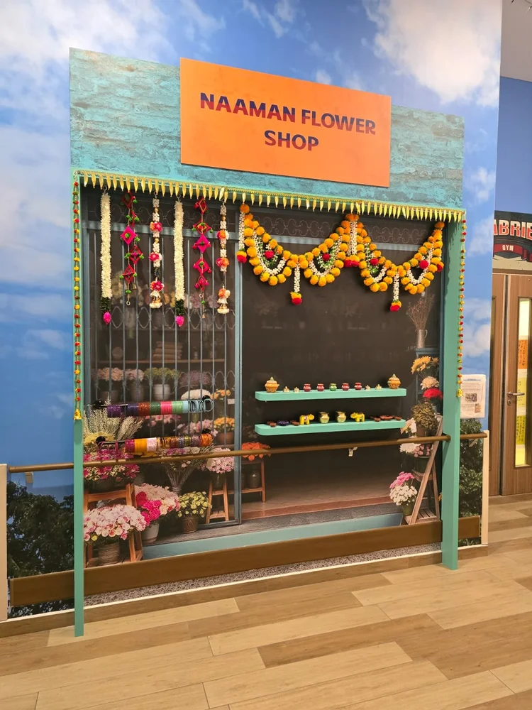 A heritage-inspired flower shop in Little India with bright garlands and sensory displays