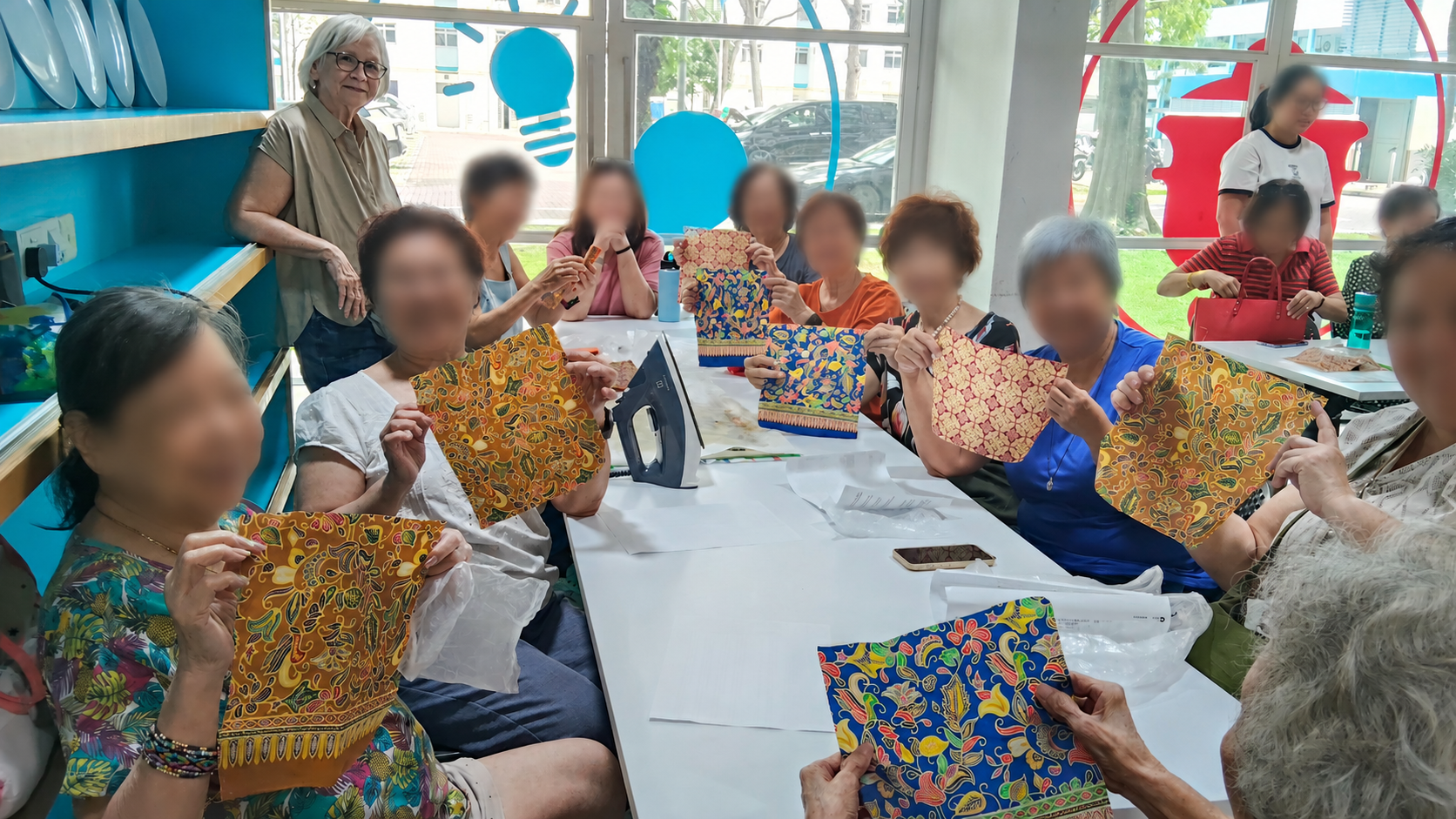 Hands-on beeswax wrap making activity promoting senior empowerment and sustainable living in Singapore