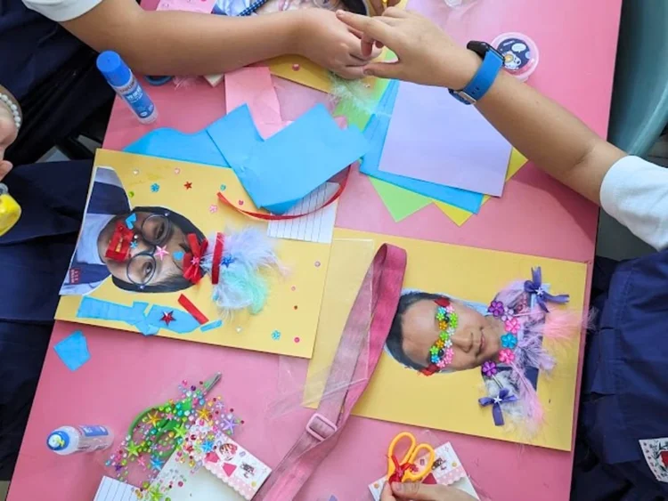 Students creating positive affirmation process art during a wellbeing art workshop