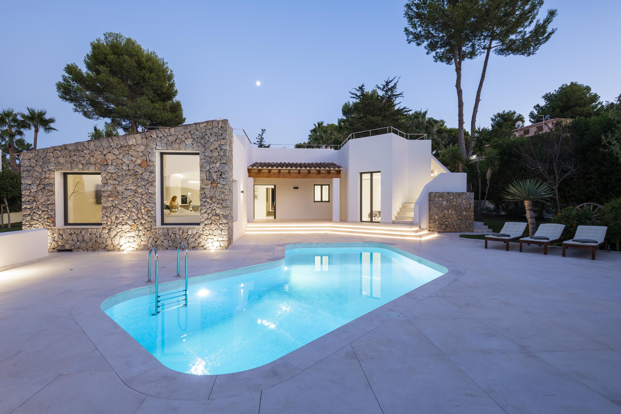 The terrace lends ample space for poolside living and entertainment.