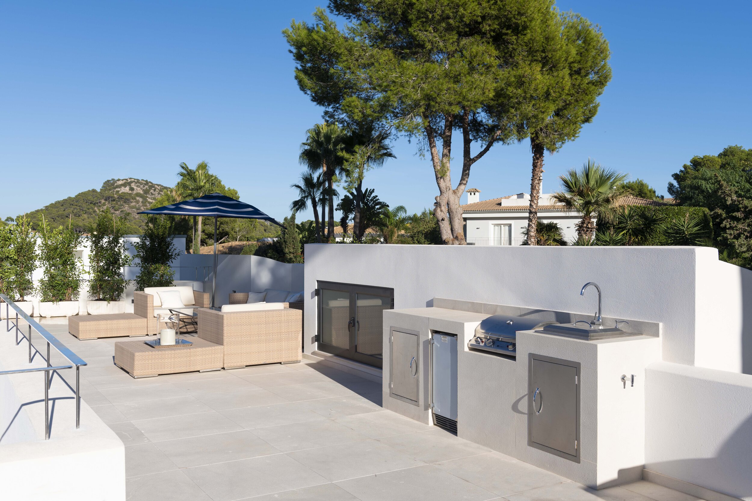 Top floor entertainment terrace with 360 degree view retaining its privacy, ideal for sunbathing and year round entertaining.