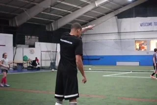 Coach Delano implementing a small sided game.