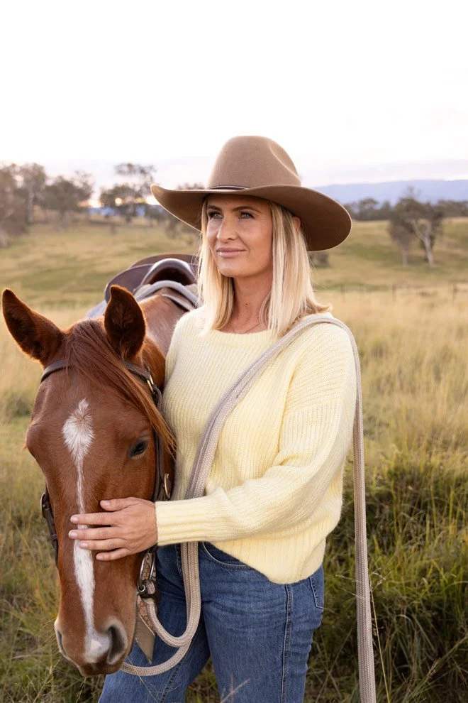 Personal brand portrait, Gen of Reins to Resilience with horse in golden afternoon light, Candelo Bega Valley NSW
