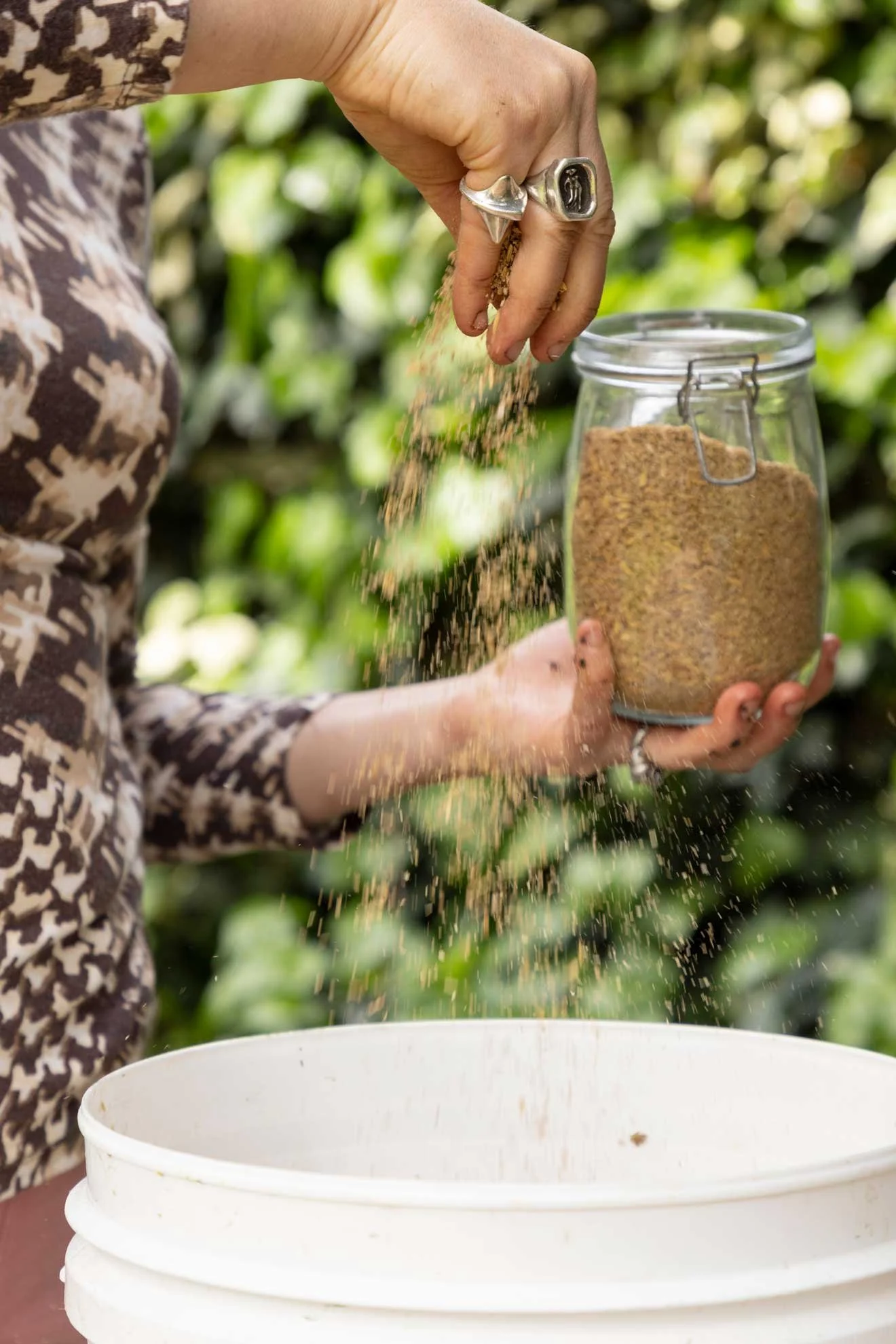 Photo of how to setup a Bokashi bin from 'Compost Coach Book' photographed by Honey Atkinson
