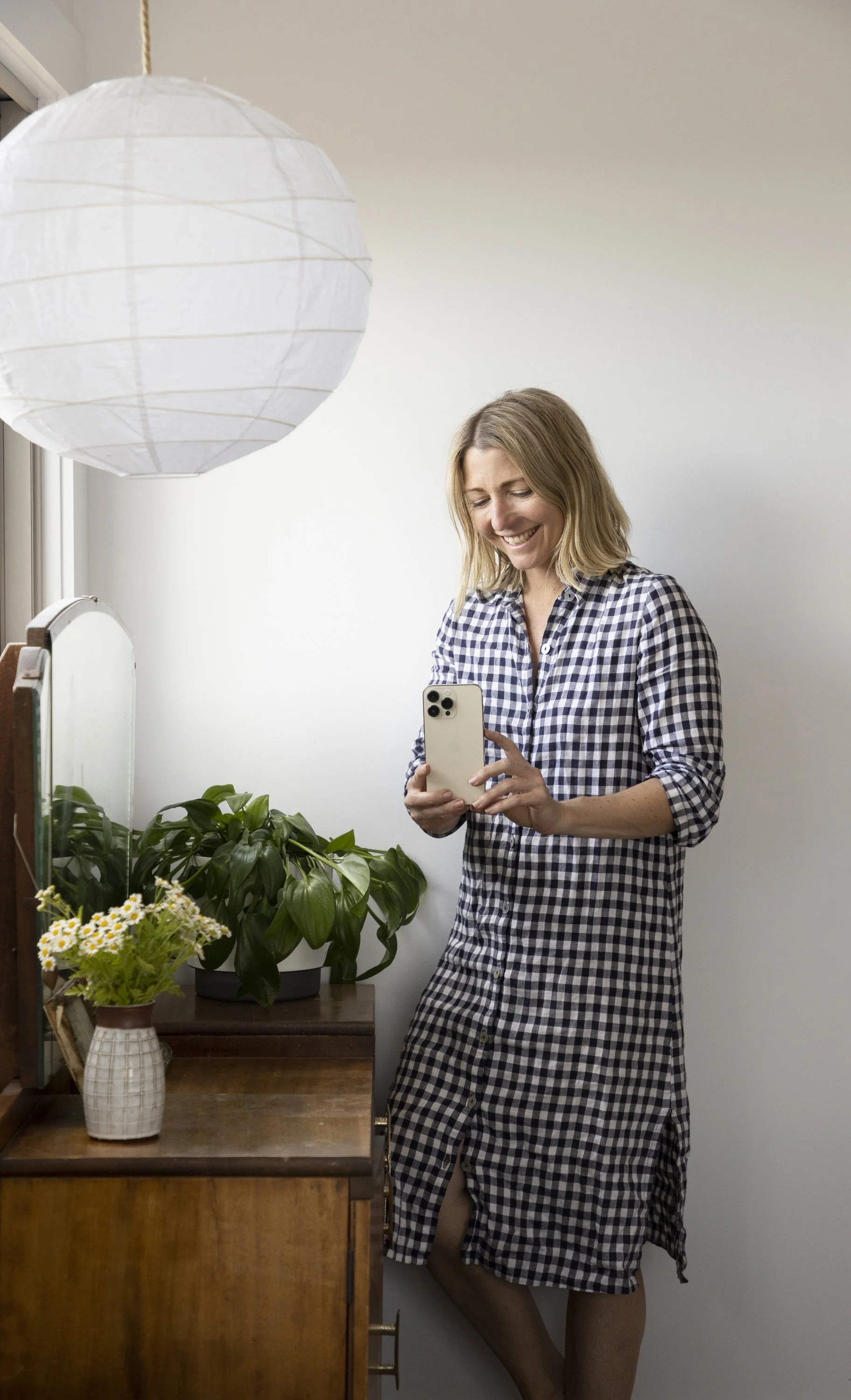 Photographer Honey Atkinson using her phone to capture video for instagram