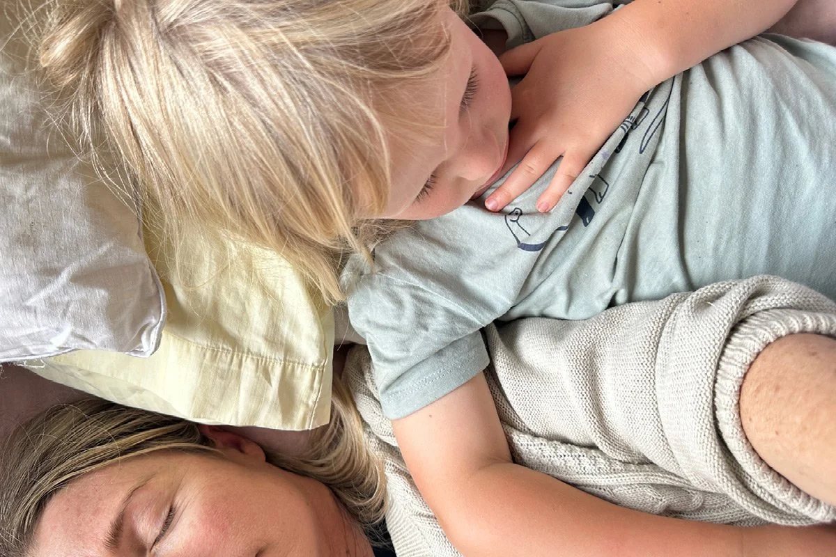 Photographer Honey and son in bed when he was sick, photographed as a quiet moment of mindfulness in everyday life.
