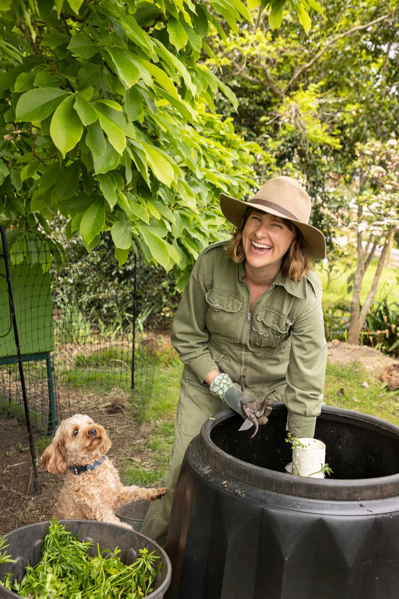 Photo of Composable Kate setting up compost bin from 'The Compost Coach' book photographed by Honey Atkinson