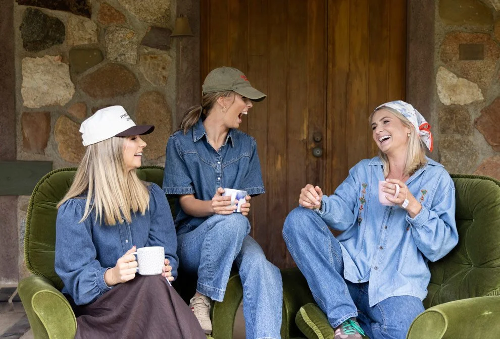 Brand photography for women in business, Sophie and Gen of Reins to Resilience with colleague laughing outdoors, Candelo NSW