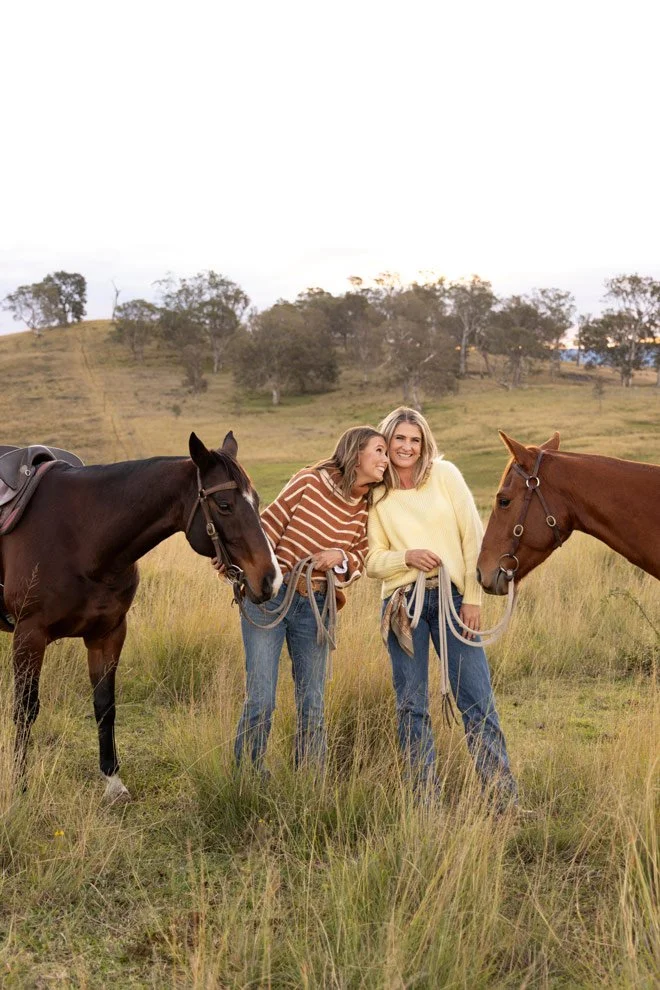 Brand photography Sapphire Coast, Sophie and Gen of Reins to Resilience laughing together with horses, Candelo Bega Valley NSW