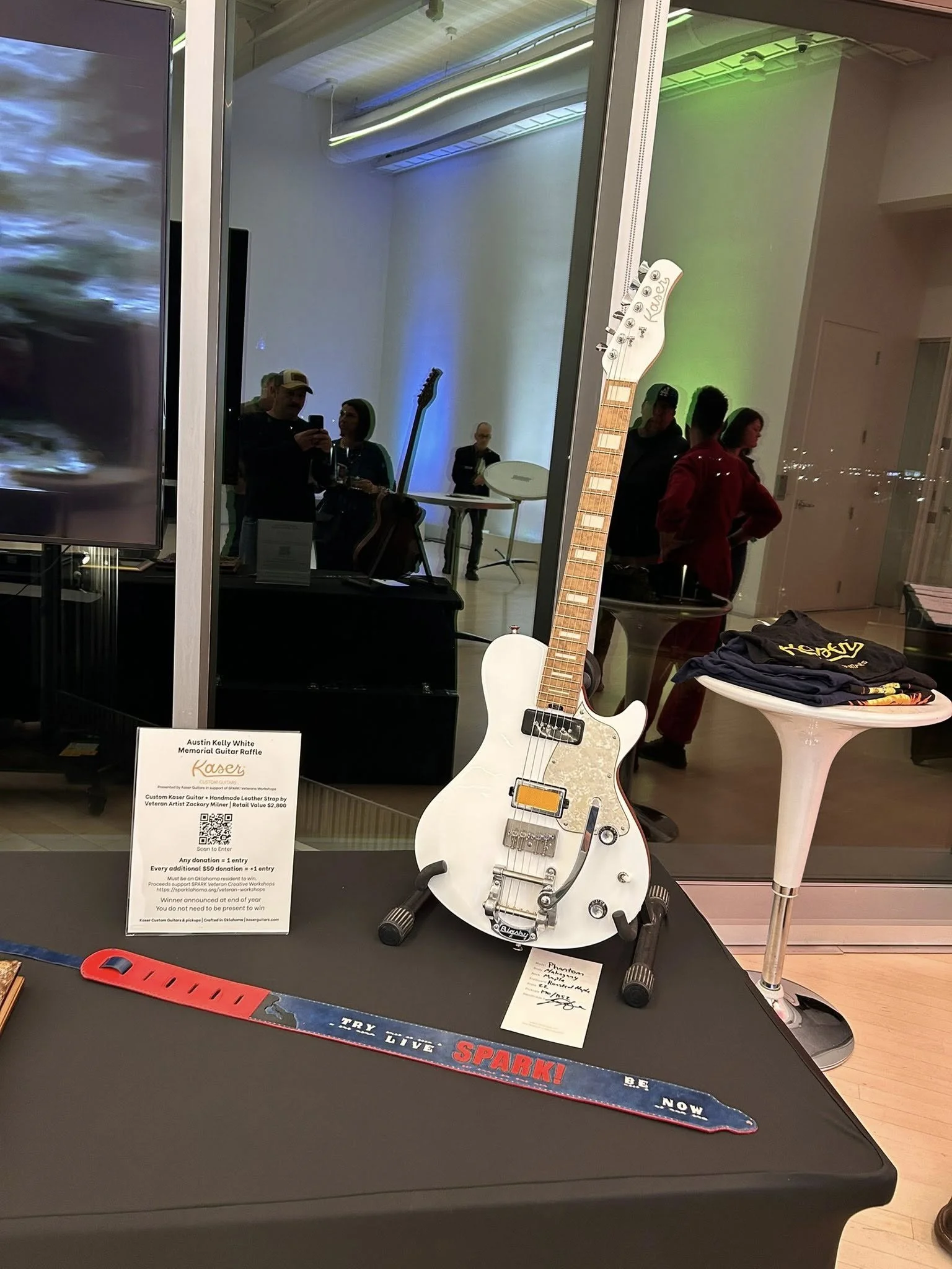 Austin White Guitar 5 with strap.jpg