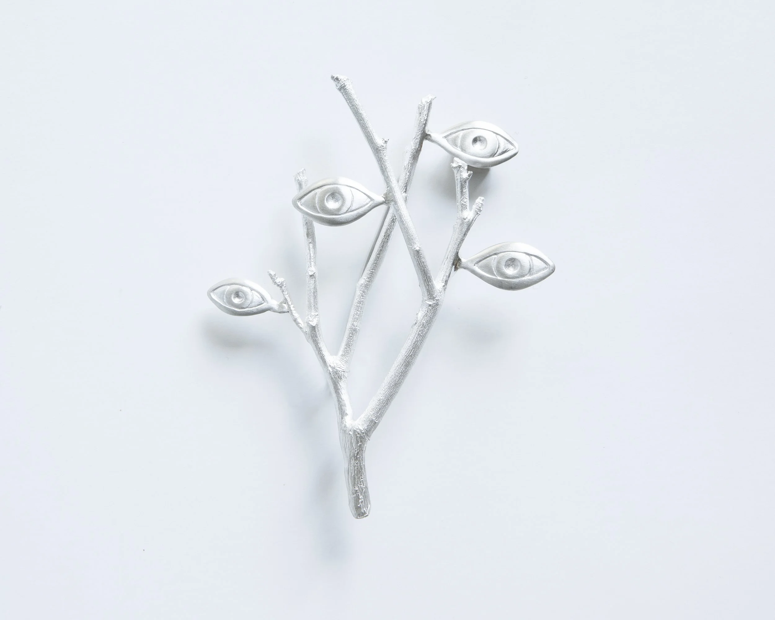 Panoptes brooch