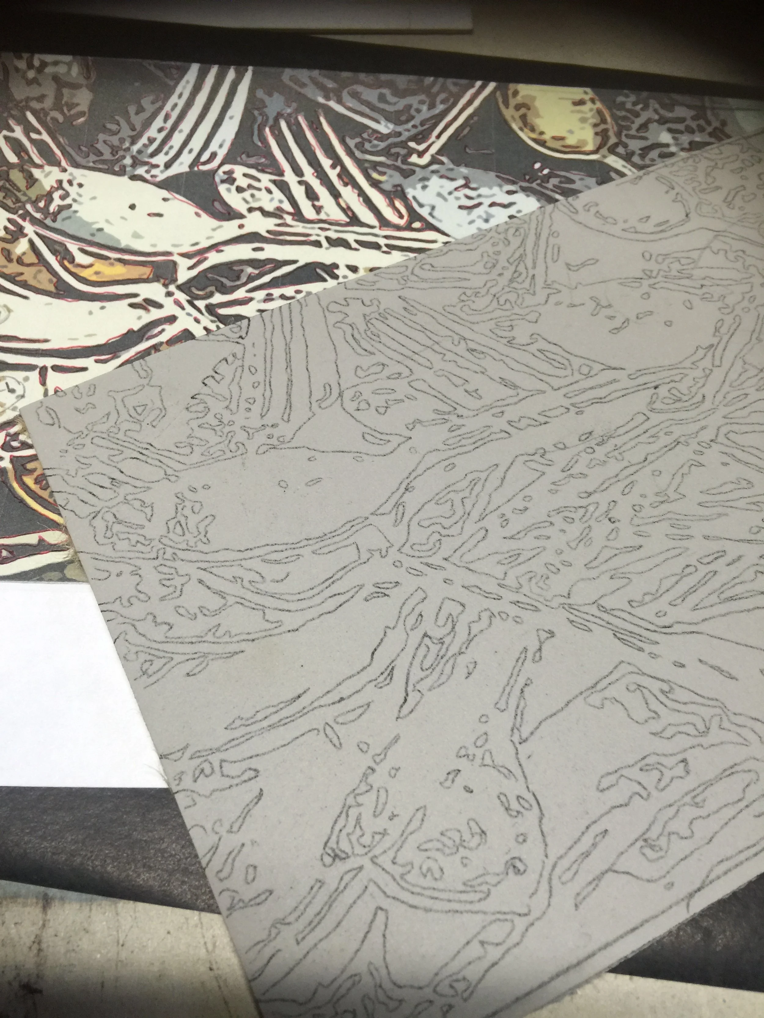 Cutting lino block for printing.