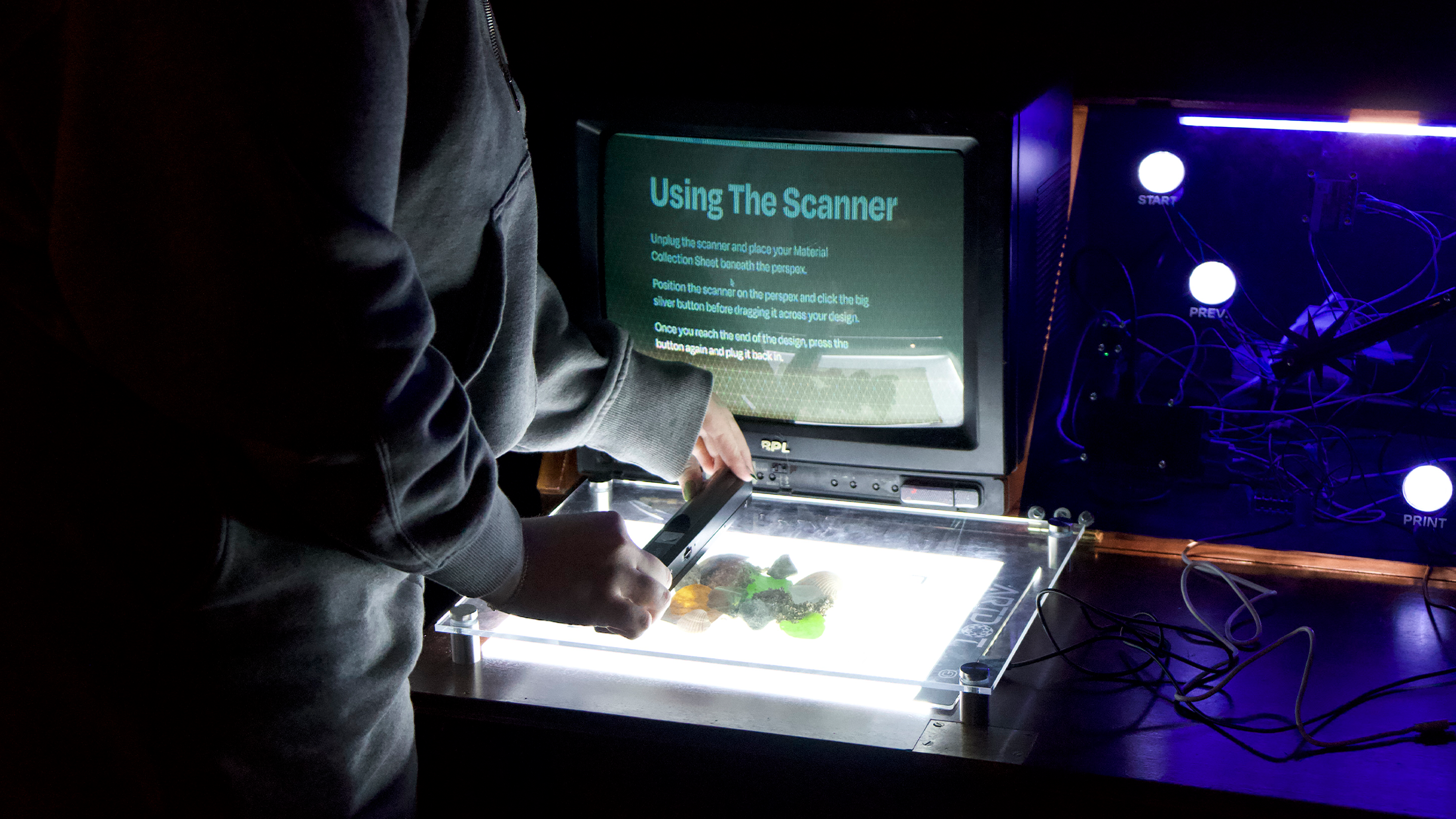 A pop-up participant scanning their Material Collection Page.