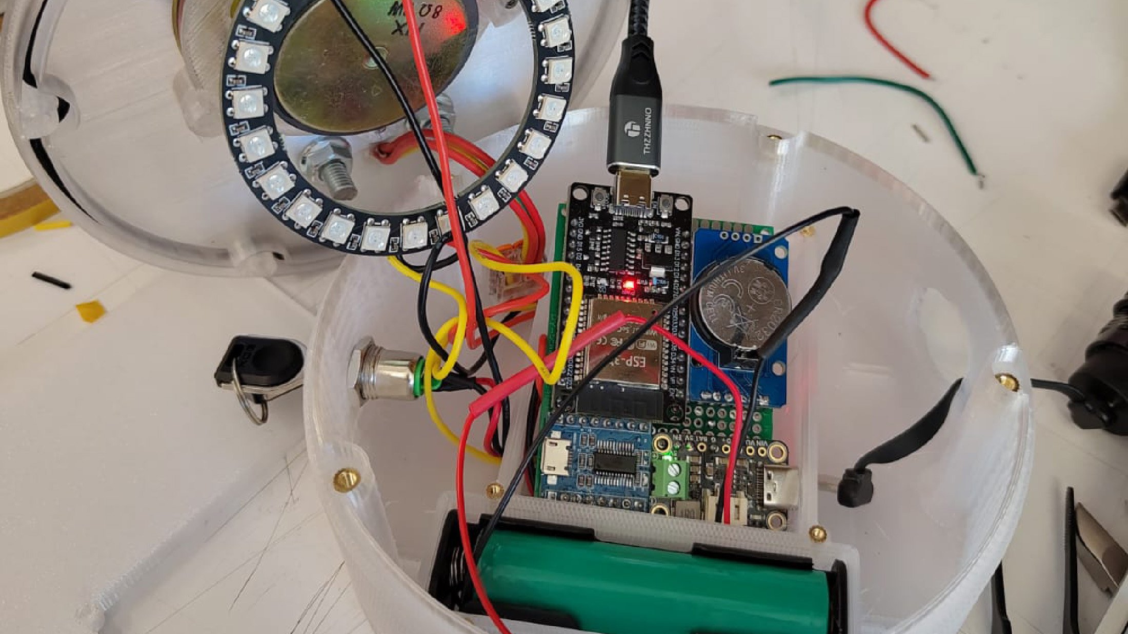 Inside the open-source Helping Hand: ESP32 control, LiPo battery, solar power and a 3D-printed PCB.