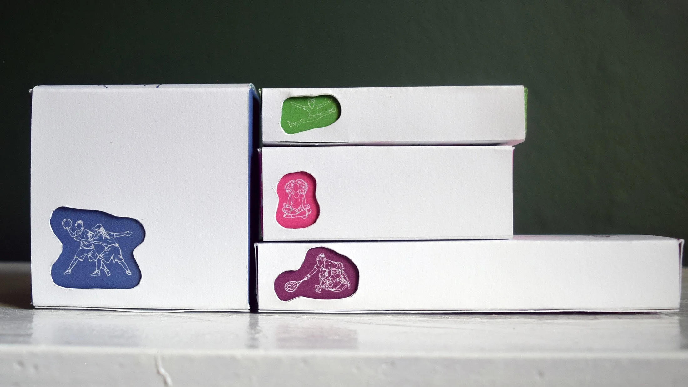 Box packaging sides with cutouts to reveal illustrations.