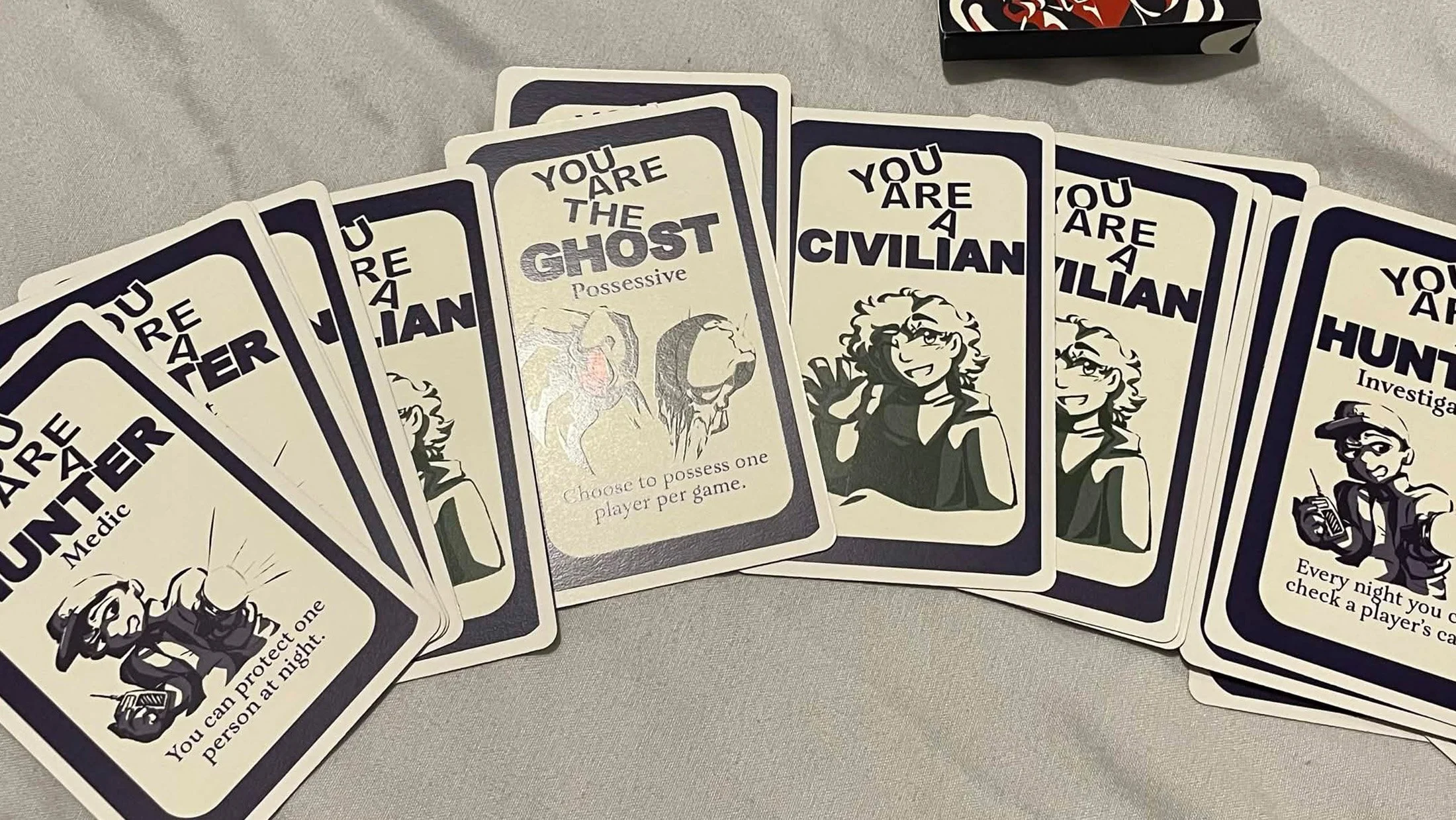 Ghost vs Hunters card spread.
