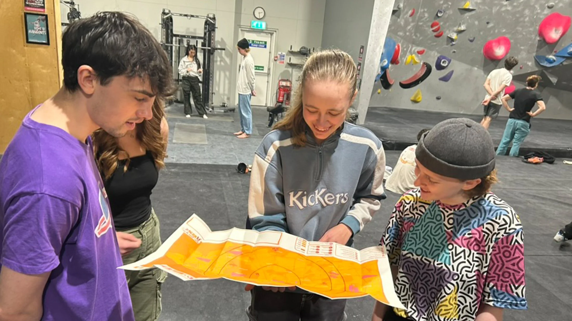 The group using the map at TCH.