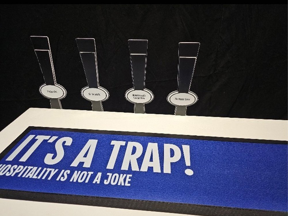 Customised bar mat and beer taps.