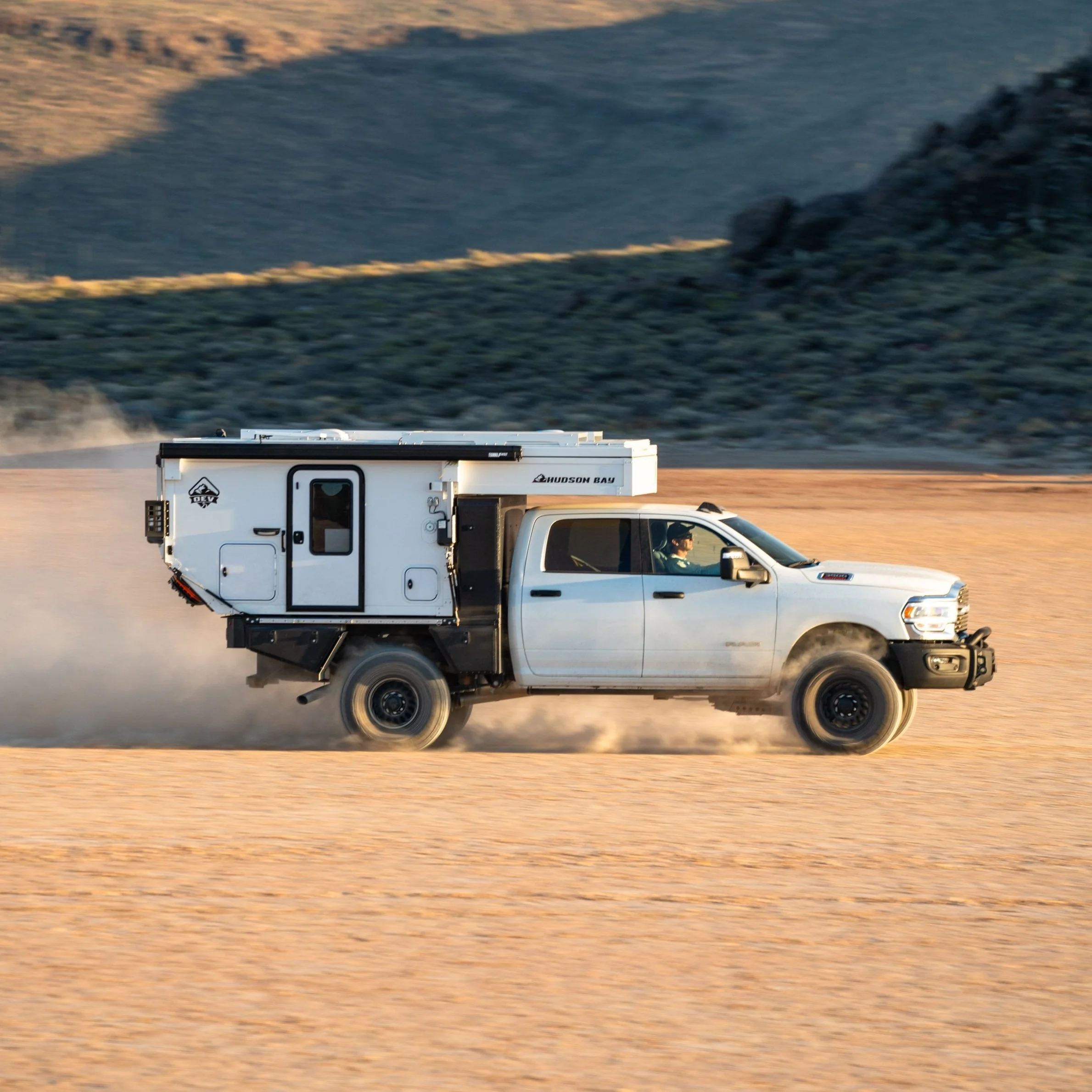 Overland Explorer Vehicles Truck Campers | Flatbed & Slide-In | Basil's ...