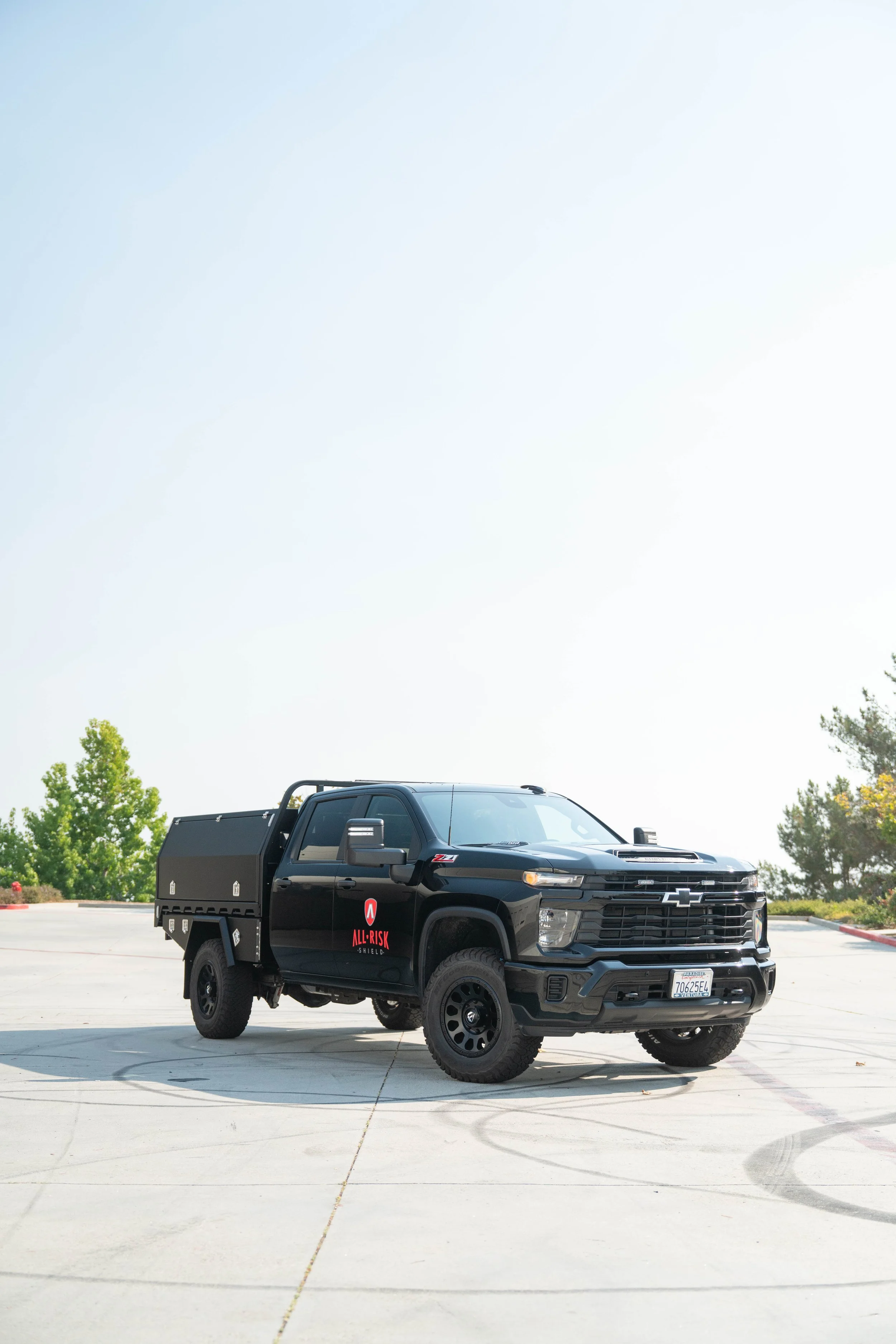 250802_BasilsGarage_AllRiskSheild-2.jpg