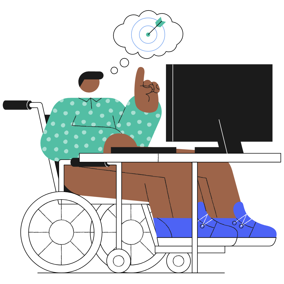 chico en silla de ruedas con ordenador