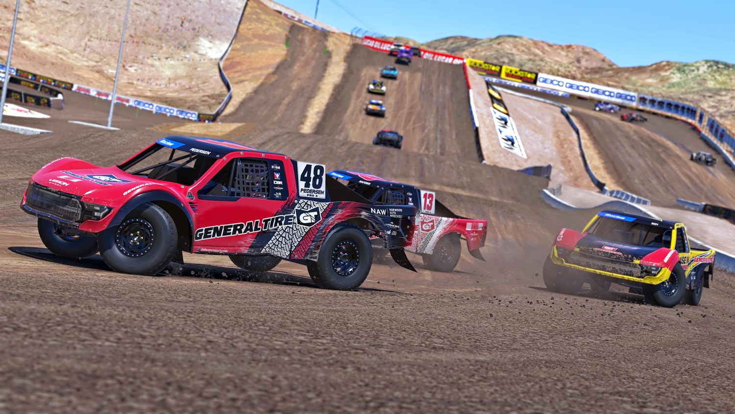 Pro off-road trucks racing on dirt