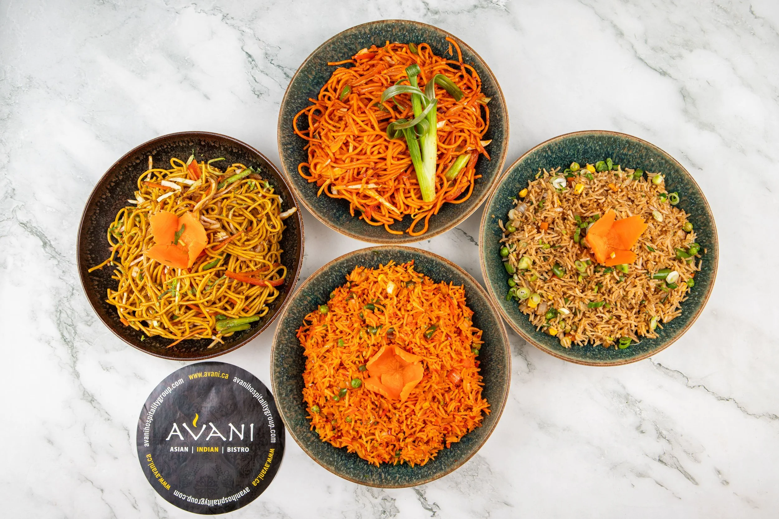 Our refined display of Hakka Fried Rice and Noodles, with their non-Hakka counterparts. Both wok-tossed and offering bold and exquisite flavours.