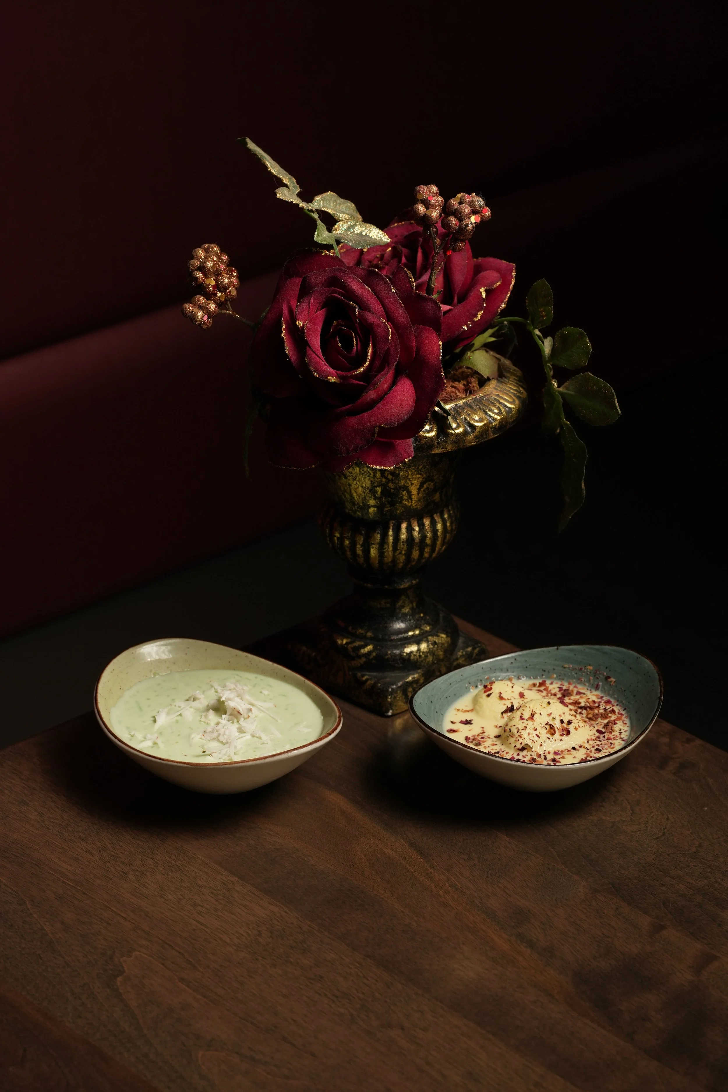 Pandan Pista Kheer: Silky slow slow-simmered rice pudding infused with pandan and pistachios, topped with toasted coconut
Winter Spice Ras Malai: Soft & creamy cottage cheese soaked in a velvety sweet eggnog milk, finished with rose petals. Festive M