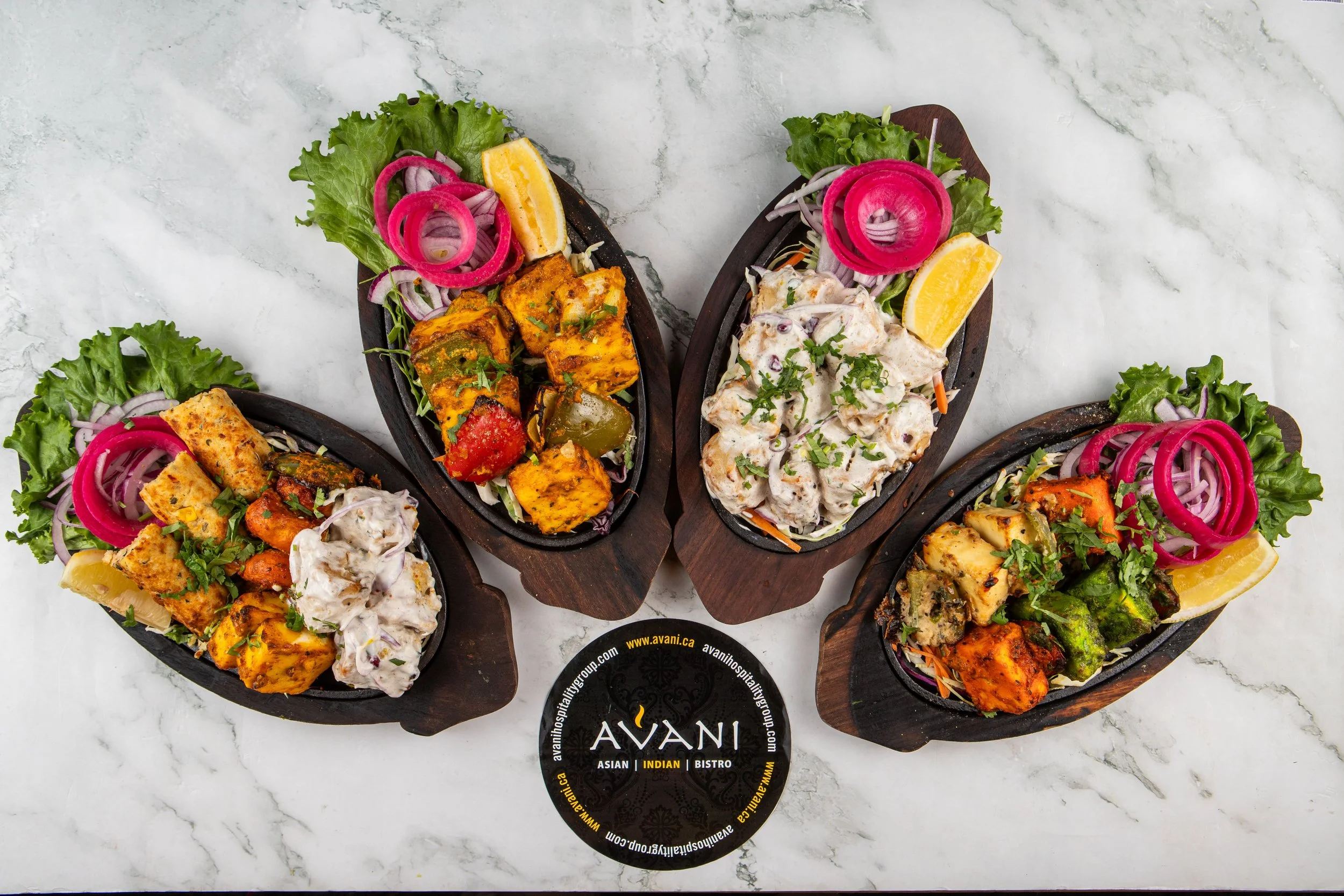 A graceful flower assortment of some of Avani's veg platters. From our crowd-favourite Paneer Tikka and Malai Soya Chaap to our Chef's crowned Zaika NCR Paneer Sampler. 
