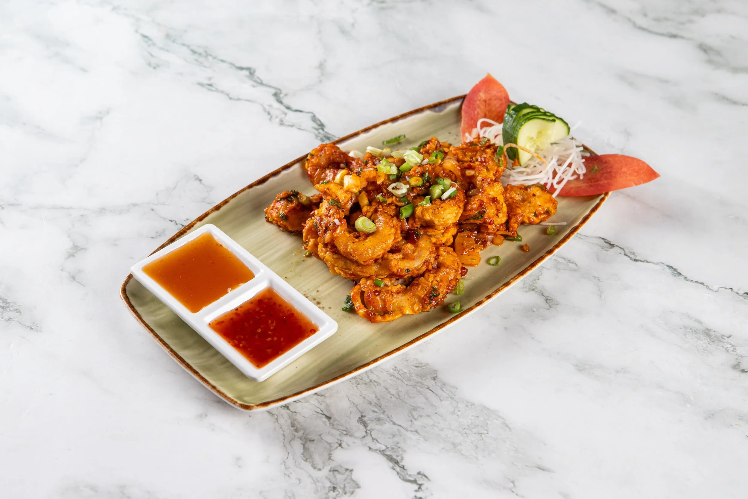 Chili Garlic Prawns: Chili Garlic Prawns
Prawns tossed with garlic, ginger, chilies, soy sauce, green onions and spices.