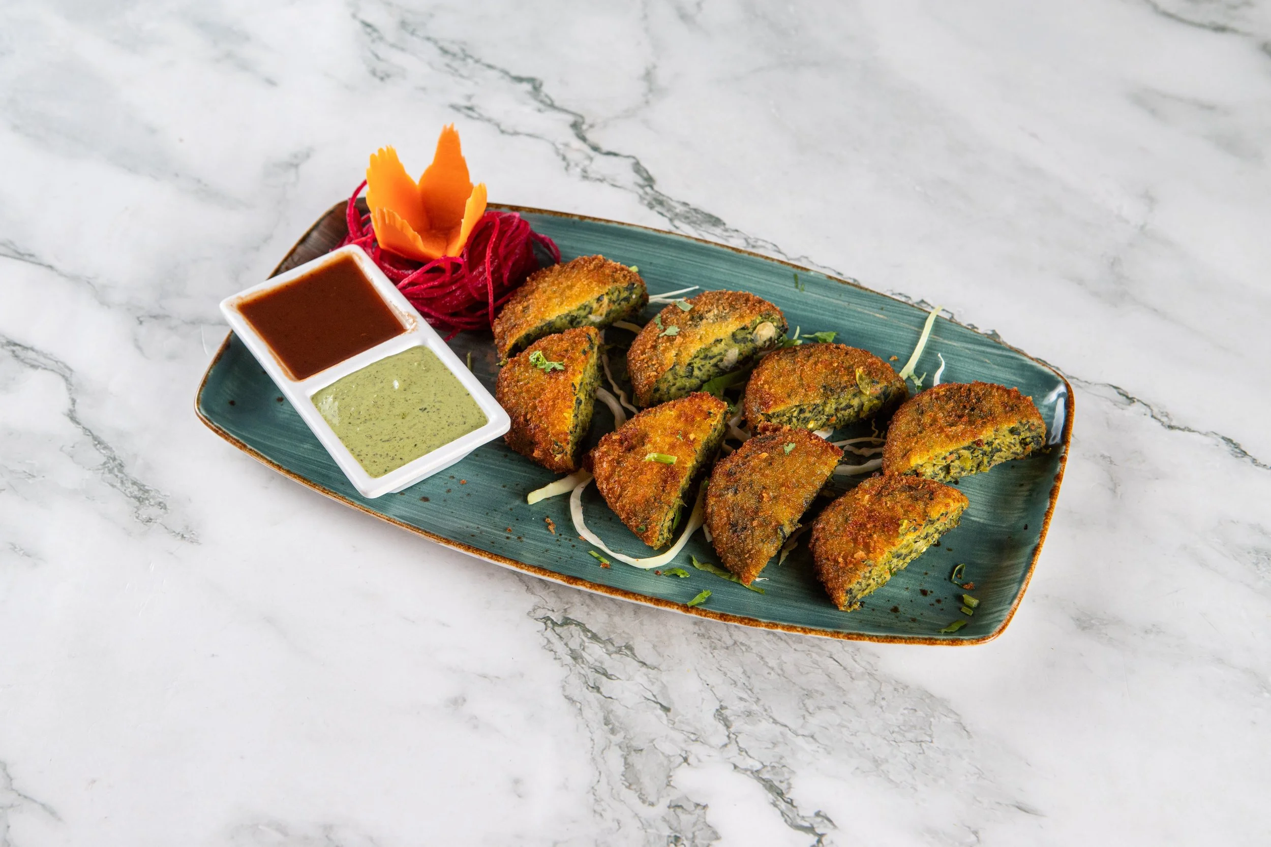 Hara Bara Kebabas: Spiced spinach, potato, pea patties.