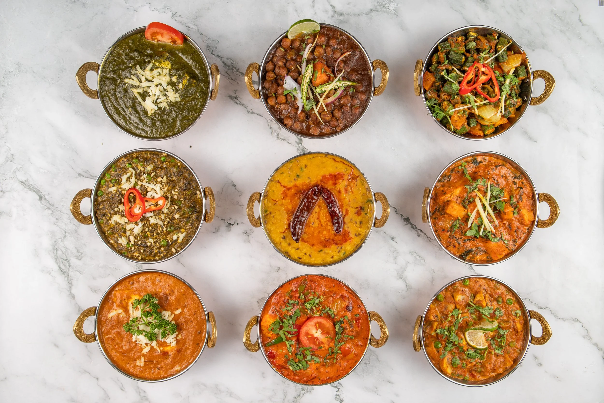 An assortment of vegetarian curries, including Dal Tadka, Mixed Veg Sabzi, Methi Malai Mutter, Kadai Paneer and Shahi Paneer. A quality line-up that sets the industry standard. 