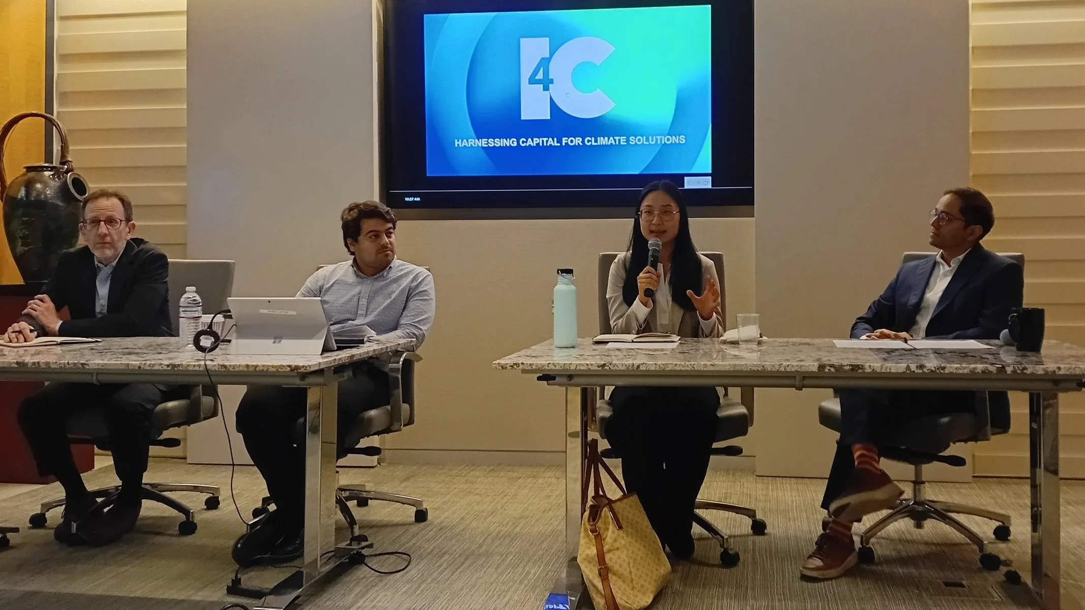 Jenny Zhang speaking on the Earth Day panel during DC Climate Week